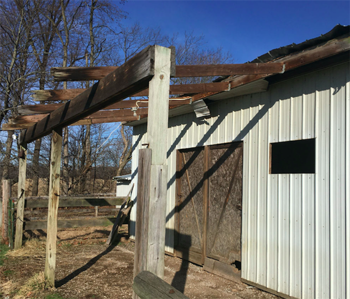 barn roof damaged due to wind