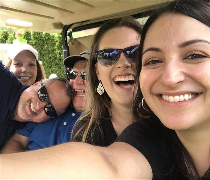 Marketing Team Golfing With Clients