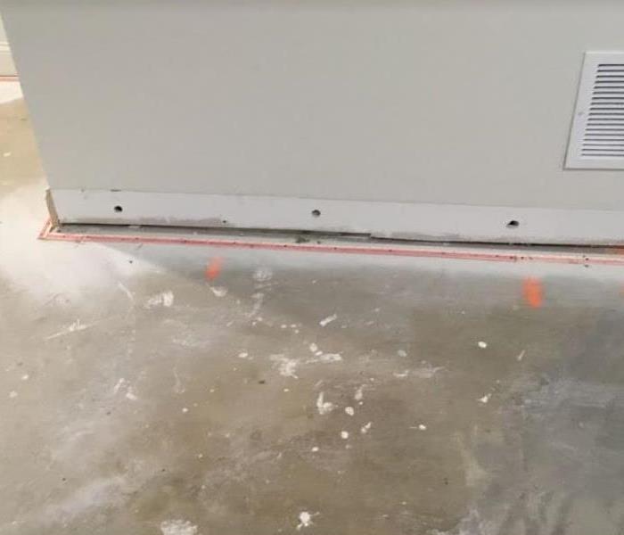 holes drilled in walls after water damage