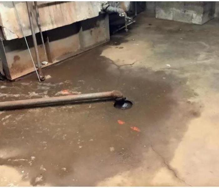 drain back up in basement